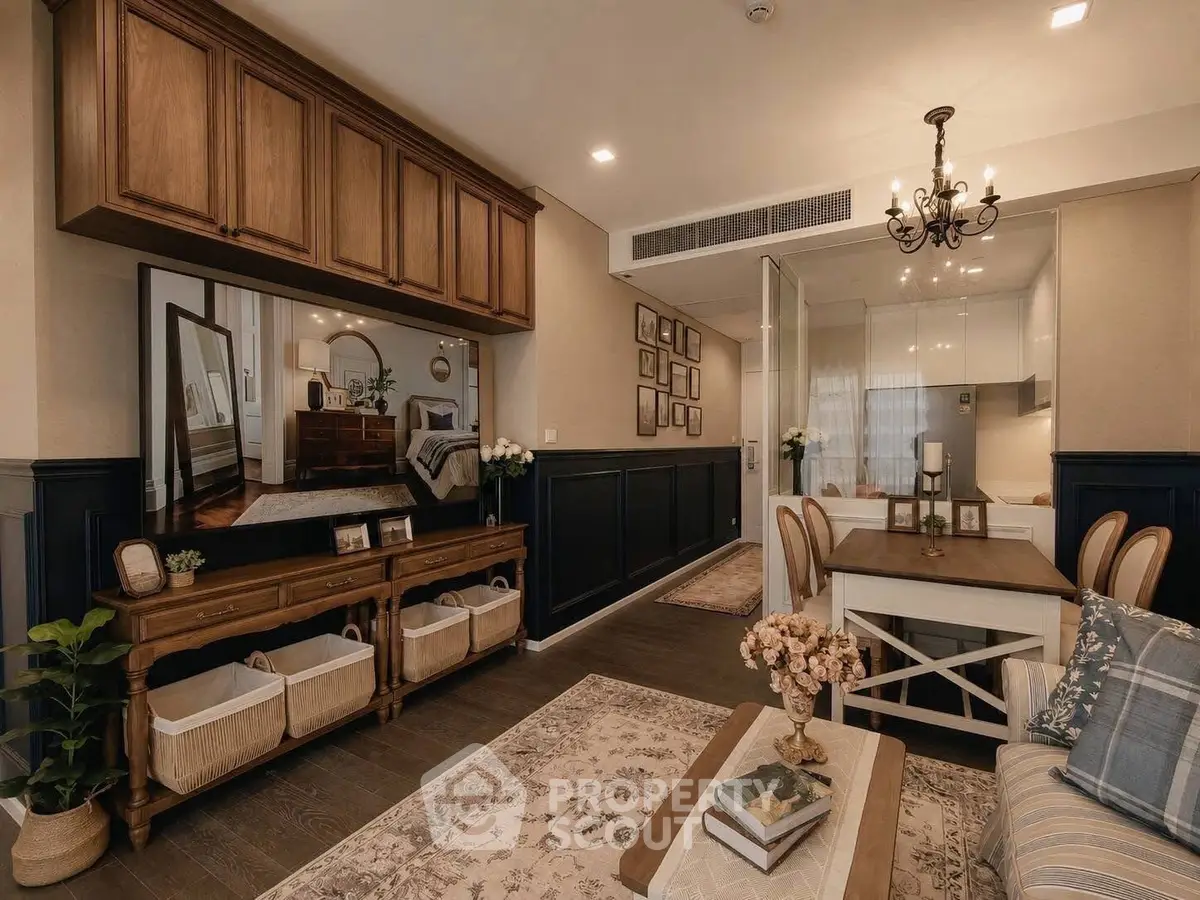 Elegant living and dining area with classic decor and warm lighting