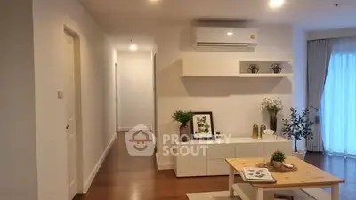 Modern living room with sleek decor and natural light