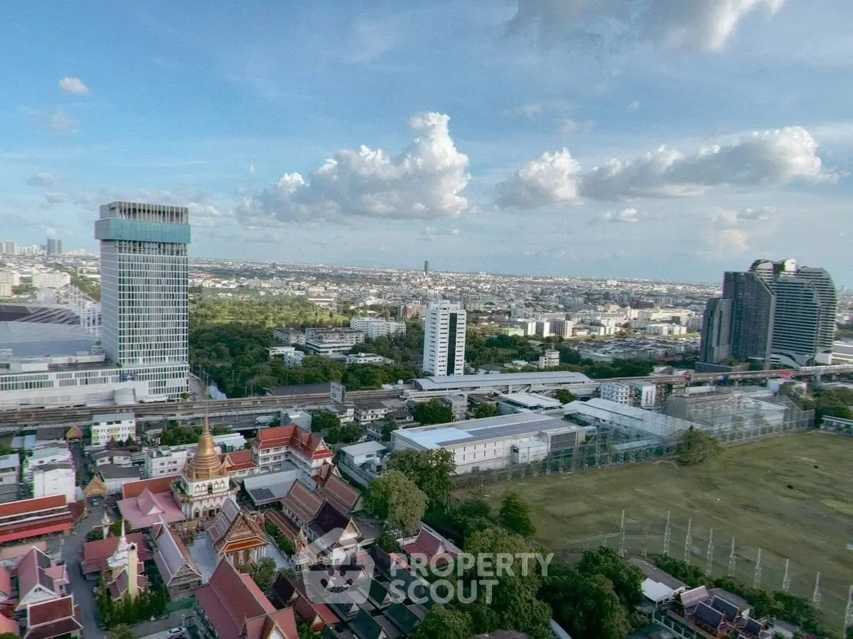 Stunning cityscape view with modern buildings and lush greenery, perfect for urban living.