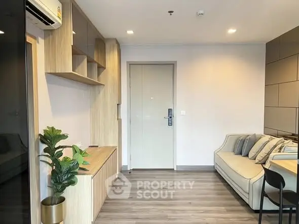 Modern living room with sleek design and cozy sofa