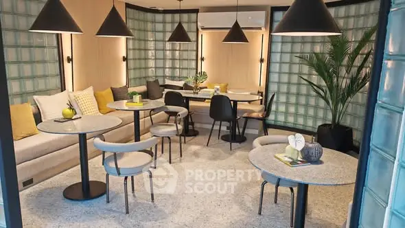 Stylish modern co-working space with elegant seating and ambient lighting