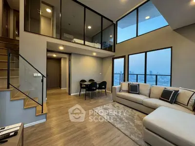 Modern duplex living room with city view and stylish decor