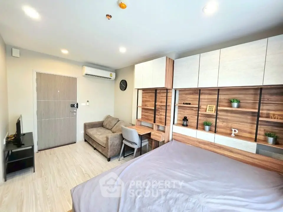 Modern studio apartment with stylish wooden accents and cozy furnishings