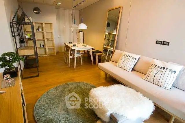 Stylish modern living room with cozy decor and wooden flooring