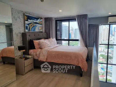 Luxurious bedroom with stunning city view and elegant decor