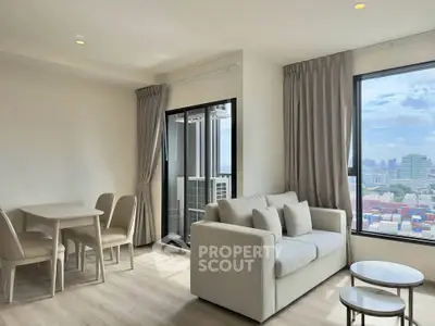 Modern living room with city view and elegant furniture