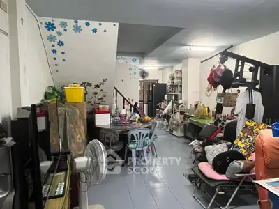 Cozy living space with eclectic decor and exercise equipment, perfect for creative living.