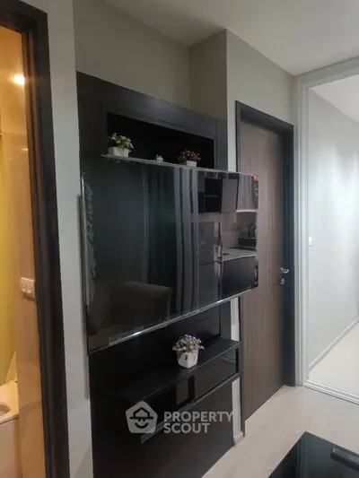 Modern living room with sleek TV setup and stylish decor