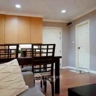 Modern living room with stylish furniture and wooden flooring