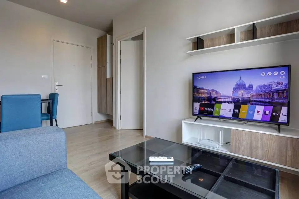 Modern living room with sleek furniture and smart TV setup