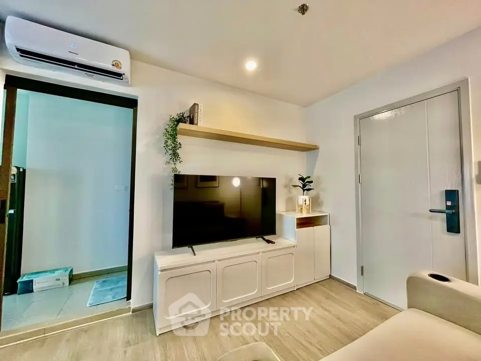 Modern living room with sleek TV setup and stylish decor