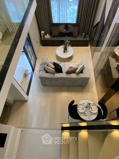 Stunning modern living room with high ceiling and elegant decor