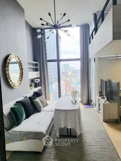 Modern loft living room with high ceiling and city view, featuring stylish decor and ample natural light.