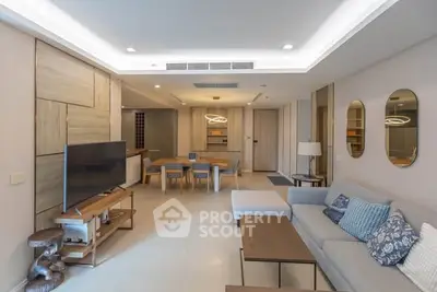 Spacious modern living room with stylish decor and open layout, perfect for entertaining.