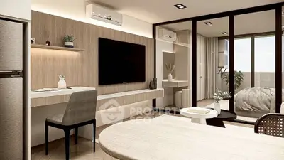 Modern living room with sleek design and large TV, featuring stylish furniture and open layout.