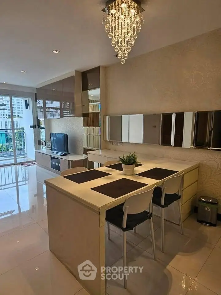 Modern open-plan living room with elegant dining area and city view.
