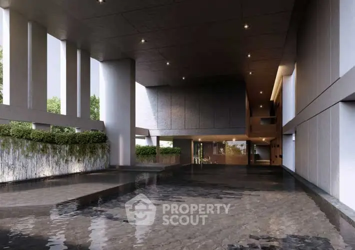 Luxurious building entrance with modern design and water feature