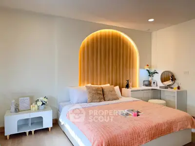 Modern bedroom with stylish lighting and cozy decor