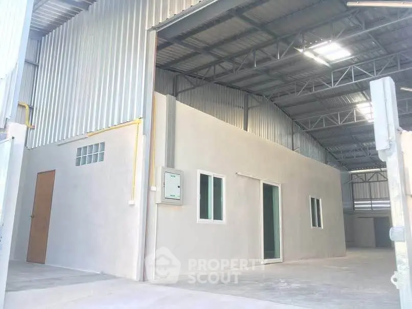Spacious industrial warehouse with high ceilings and modern design