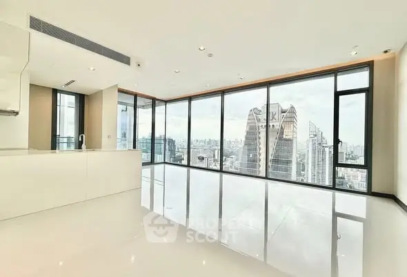 Luxurious corner unit with panoramic city views and spacious open layout.
