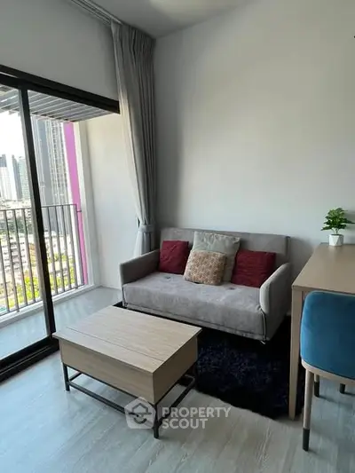 Modern living room with balcony view in urban apartment