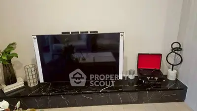 Modern living room with sleek TV setup and stylish decor
