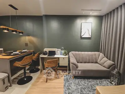 Stylish modern living room with cozy sofa and chic dining area