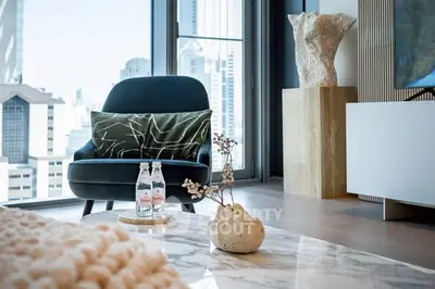 Luxurious living room with modern decor and stunning city view