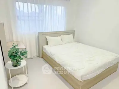 Bright and cozy bedroom with modern decor and natural light