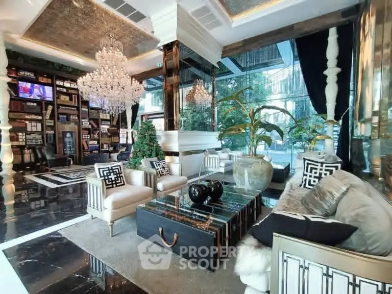 Luxurious living room with elegant chandeliers and modern decor in a high-end property.