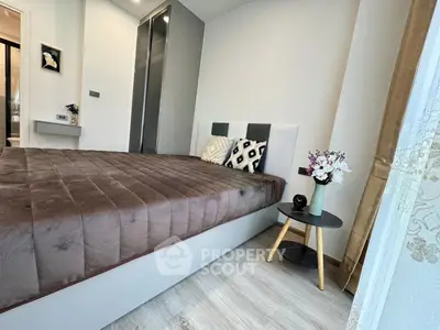 Modern bedroom with stylish decor and cozy atmosphere