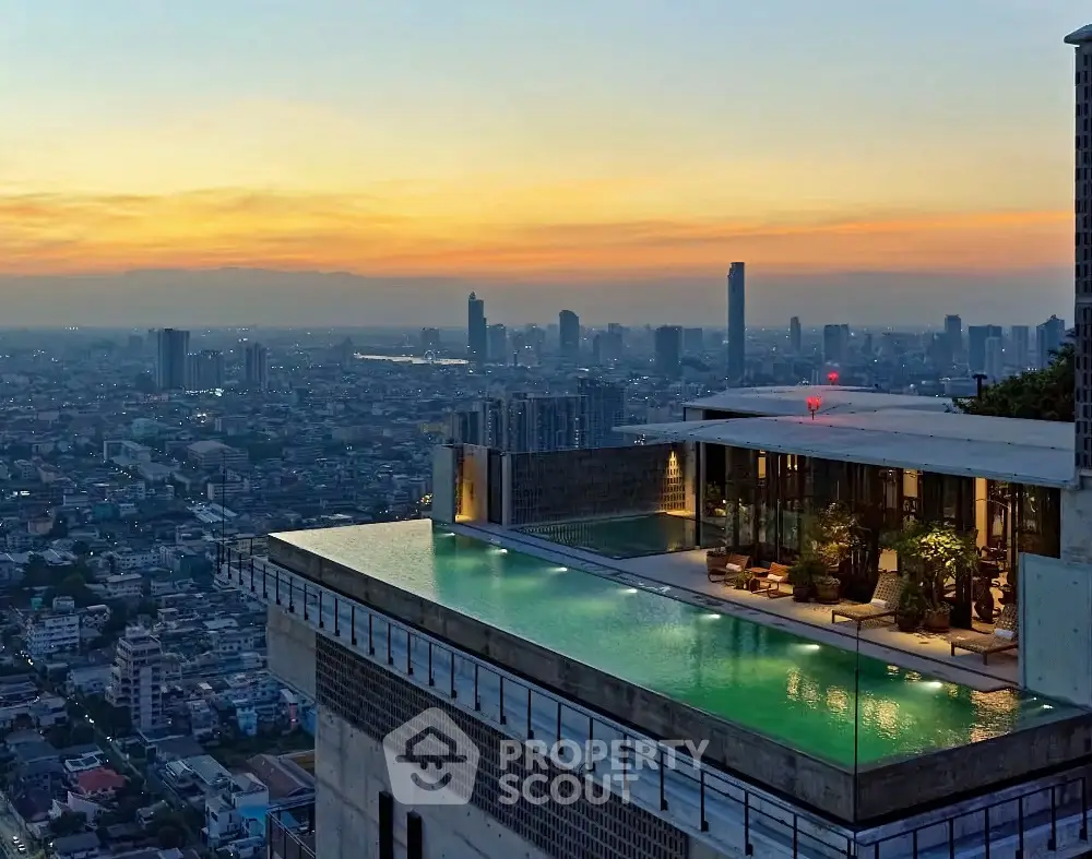 Luxurious rooftop infinity pool with stunning city skyline view at sunset