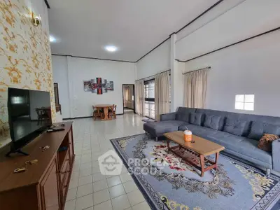 Spacious living room with modern decor and large sectional sofa