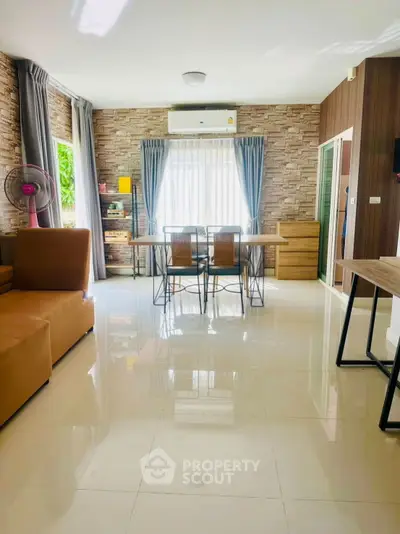 Spacious modern living room with stylish decor and natural light