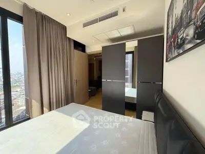Modern bedroom with city view and stylish decor