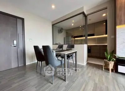 Modern dining area with open kitchen and stylish decor