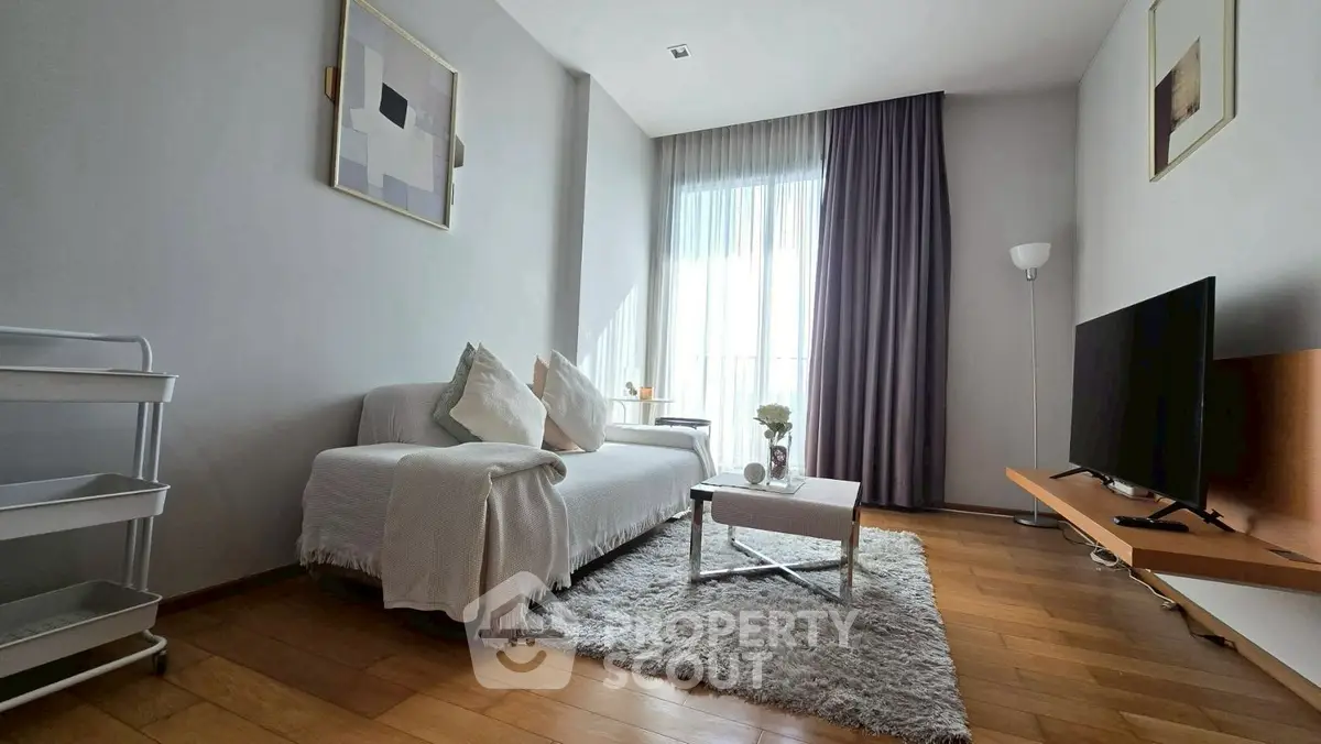 Modern living room with cozy sofa and stylish decor