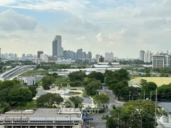 Stunning cityscape view with lush greenery and modern skyline