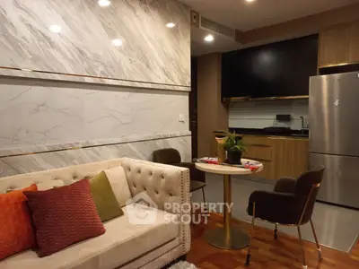 Modern living room with elegant marble wall and cozy seating area