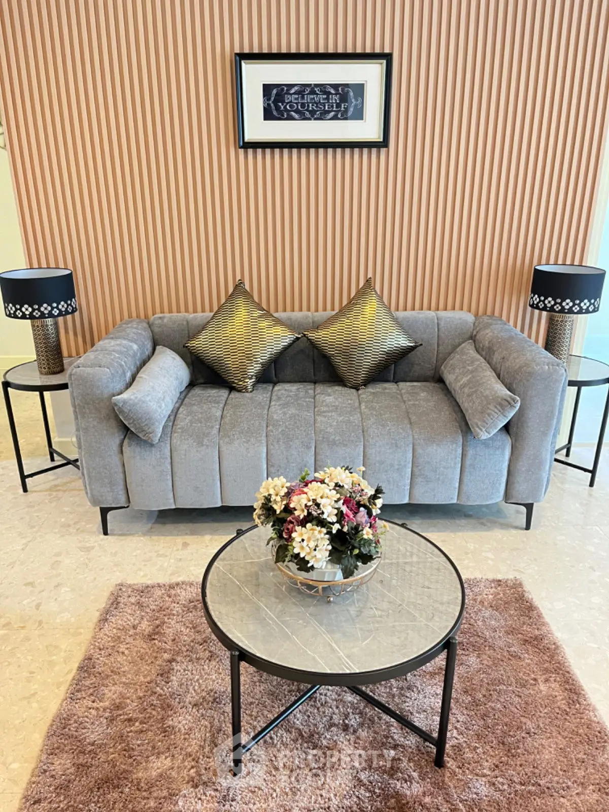 Modern living room with stylish sofa, elegant decor, and chic coffee table