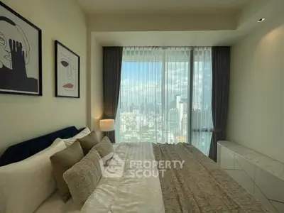 Luxurious bedroom with stunning city view and elegant decor