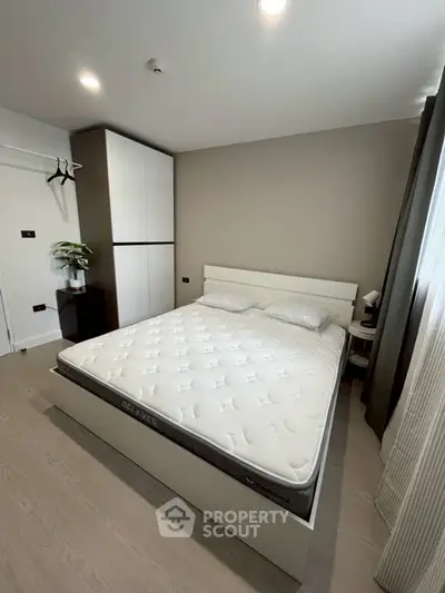 Modern bedroom with minimalist design and natural light