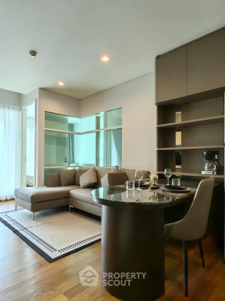 Modern living room with sleek furniture and open layout, perfect for urban living.