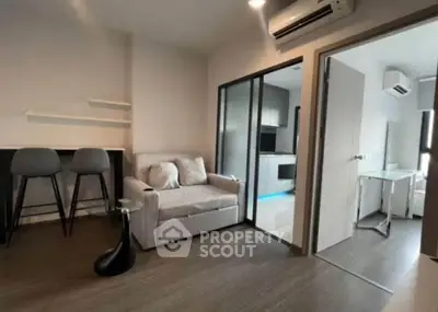 Modern apartment interior with cozy living area and stylish kitchen