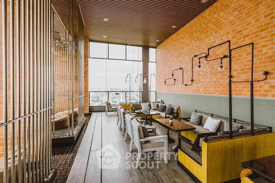 Modern rooftop lounge with stylish seating and panoramic city views, perfect for relaxation and social gatherings.