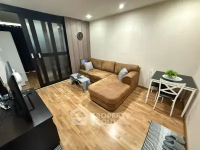 Cozy living room with modern furniture and wooden flooring