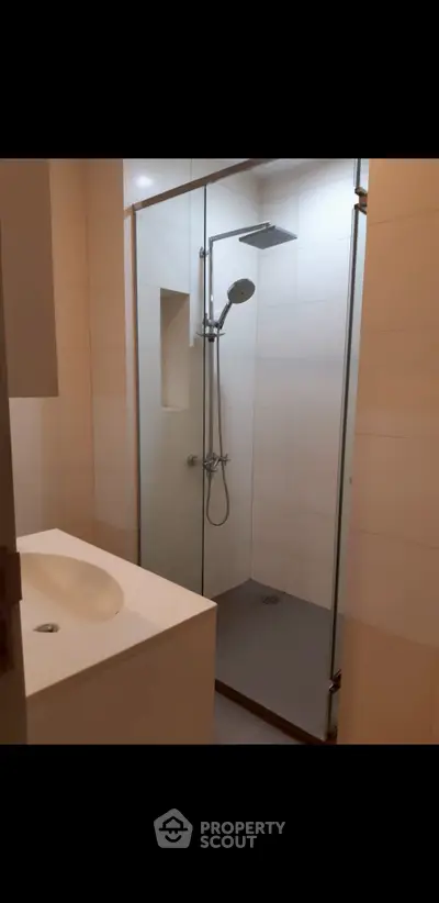 Modern bathroom with sleek shower and stylish sink