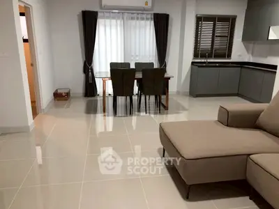 Modern living room with sleek furniture and open layout, perfect for contemporary living.