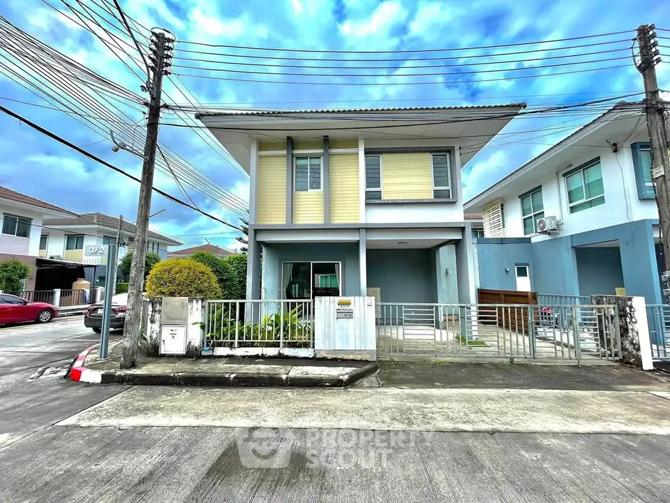 Charming two-story house with modern facade in a serene neighborhood, perfect for family living.