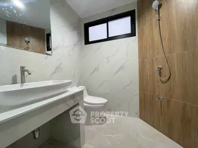 Modern bathroom with sleek fixtures and elegant marble tiles